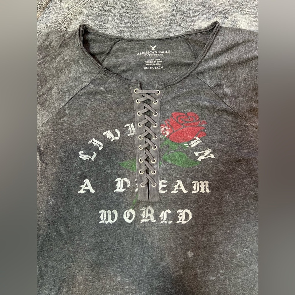 American Eagle Women’s Vintage Distressed T shirt “ living in a dream world”